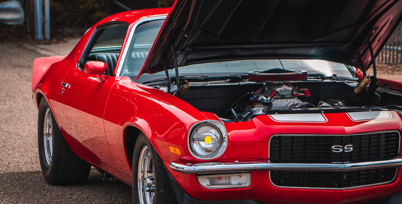 Open hood of a sport car.